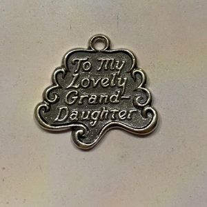 Retired James Avery charm. Will have a cut loop.